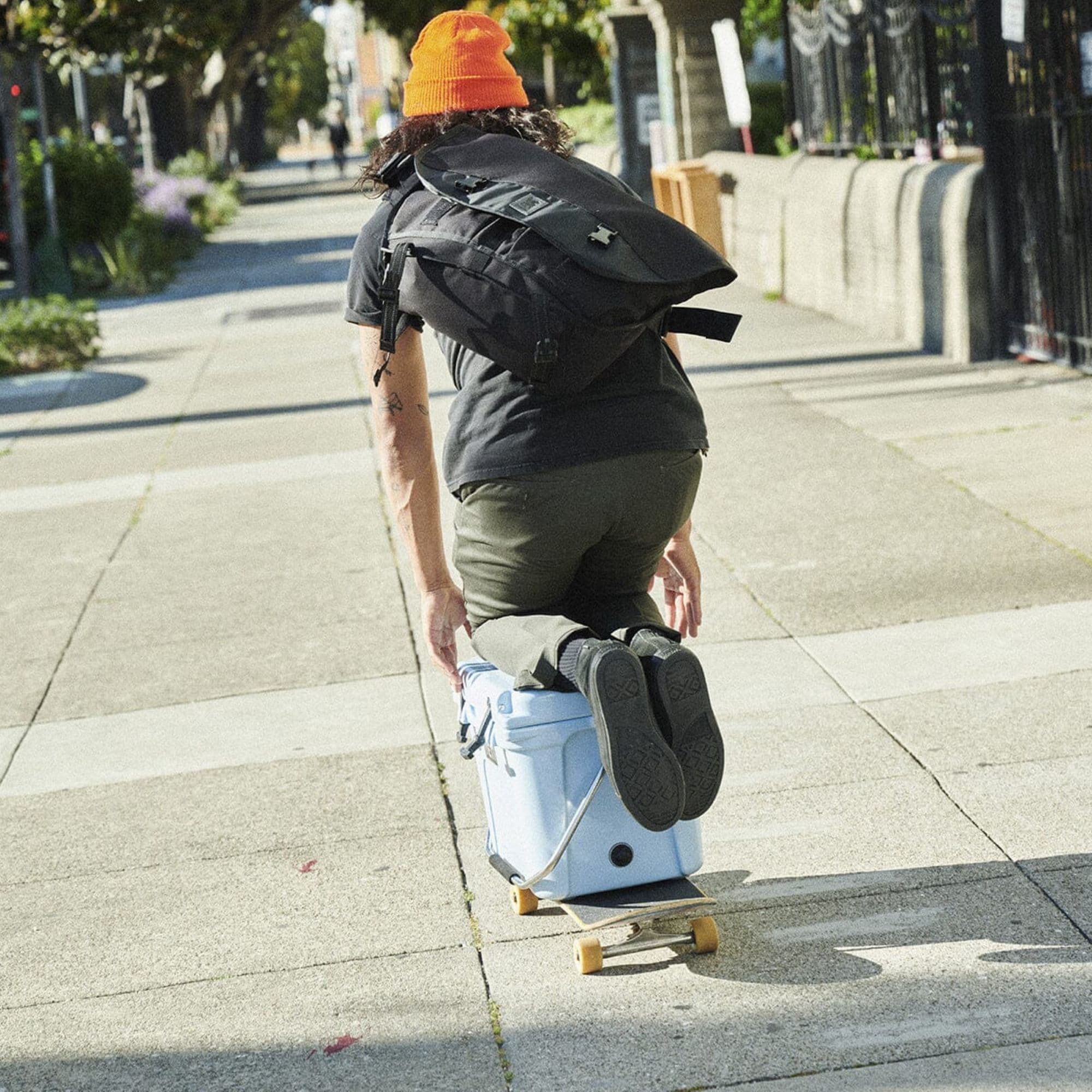 Citizen 24L on the back of a guy riding on a cooler