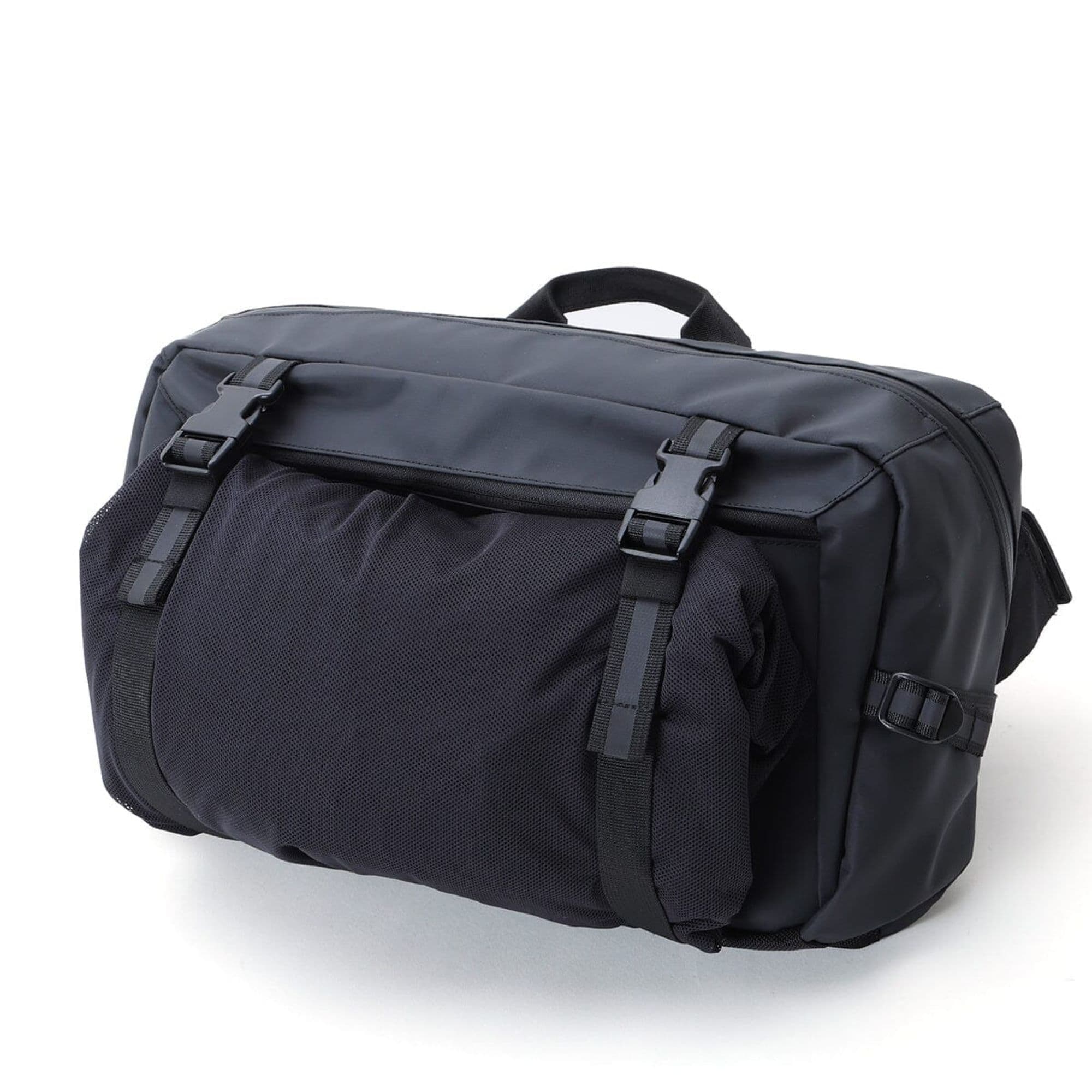 A jacket rolled up in the front of the Kadet Max n Black Tarp #color_black tarp