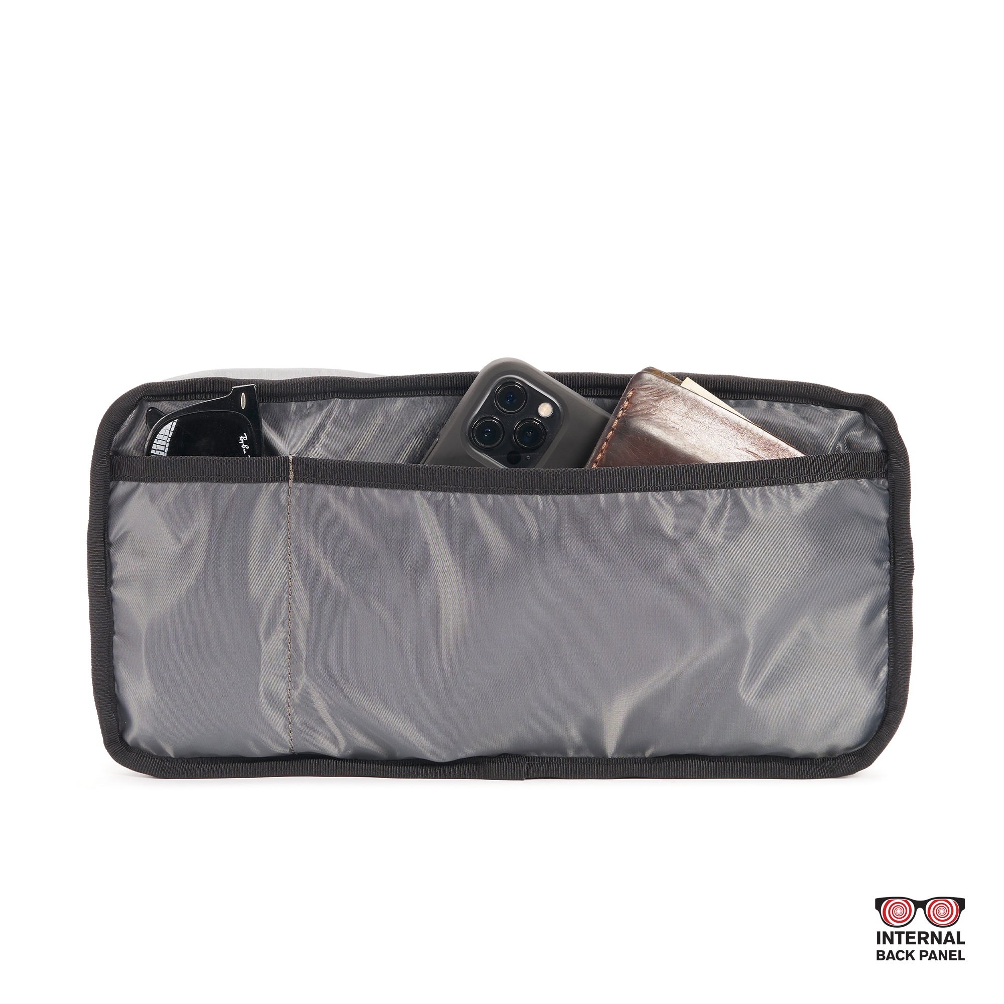 The inside pockets of the Mini Kadet #color_black