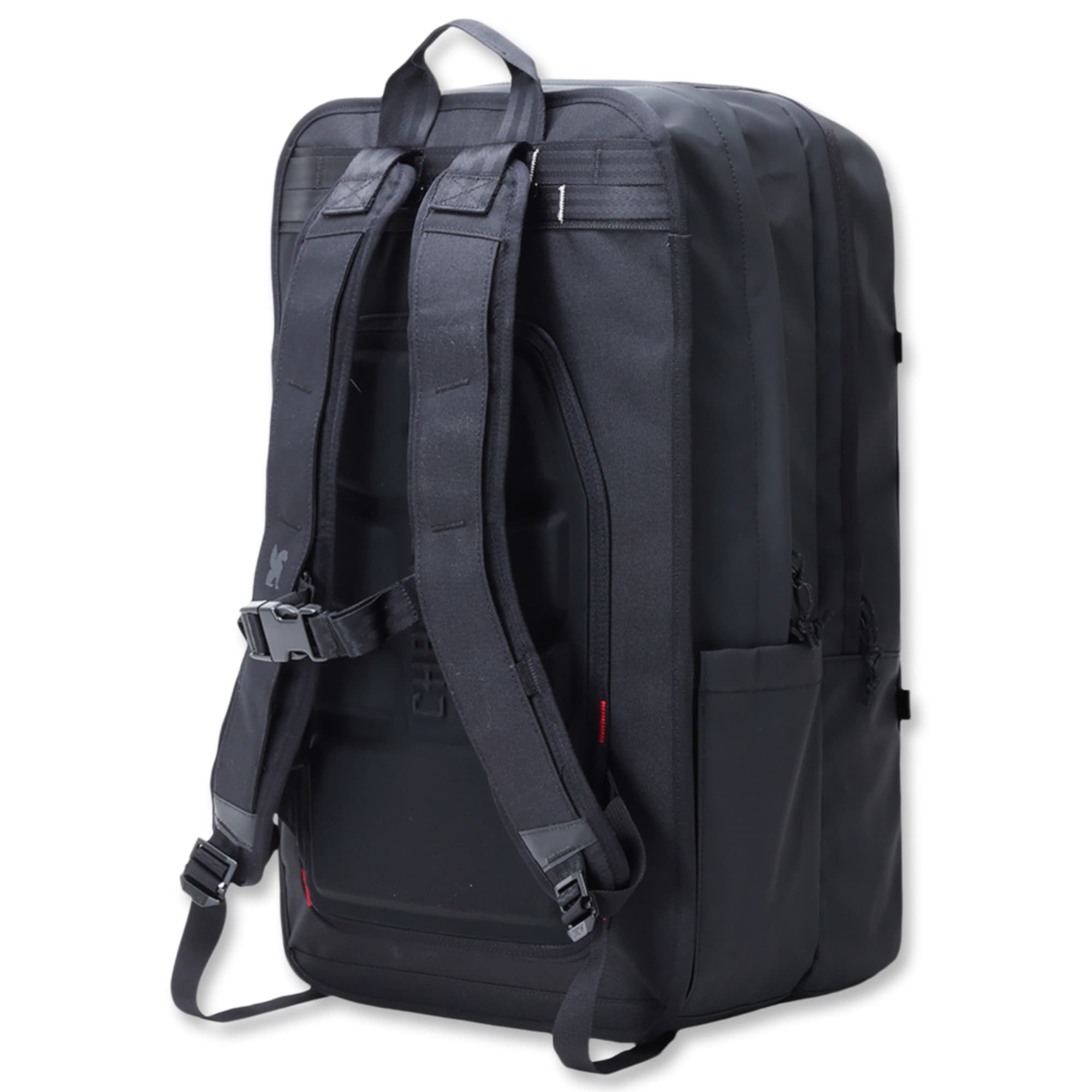 The back straps of the Cohesive 38L Pack #color_black tarp